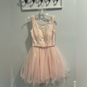 Baby Pink/Peach Sleeveless Mini Dress with lace detailing and tulle skirt.